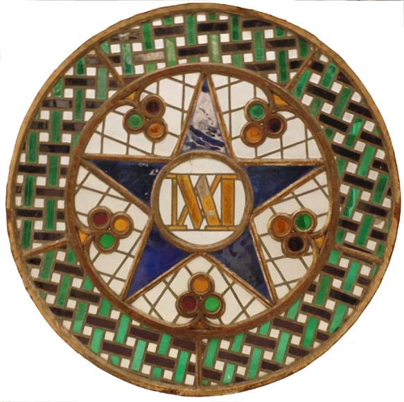 Stained_glass_rose_window_with_star.jpg