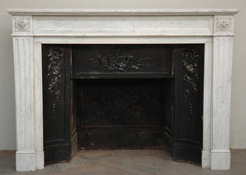 Semi_statuary_Louis_XVI_style_mantel_.jpg