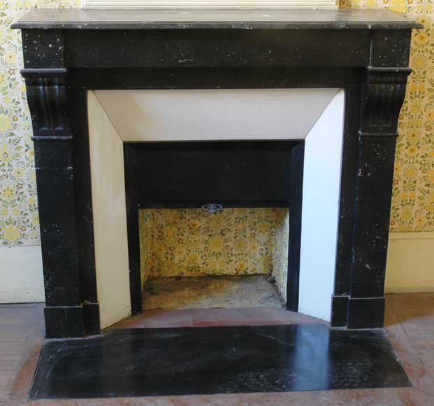 Black_marble_fireplace_surround_with_modillions.jpg