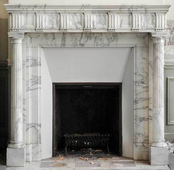 White_marble_mantel_with_detached_columns.jpg