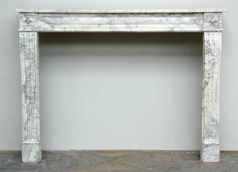Louis_XVI_white_marble_mantel_from_the_18th_century.jpg