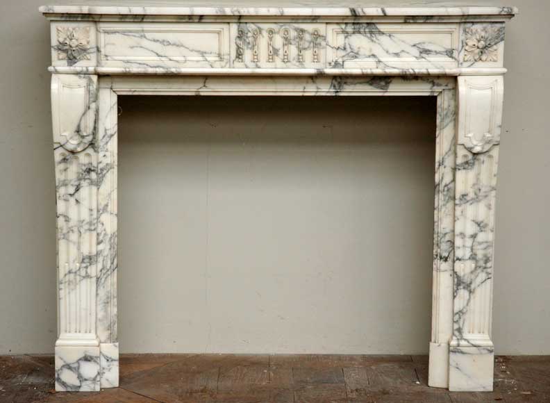 White_Marble_Louis_XVI_mantel_with_fluting_.jpg