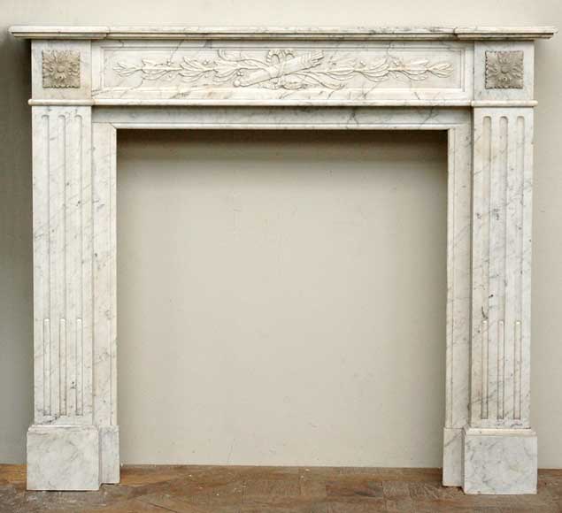 White_marble_Louis_XVI_mantel_with_quiver.jpg