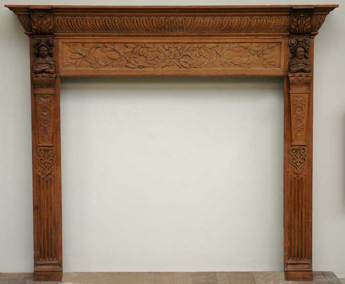 Antique_19th_century_Oak_mantel_with_carved_figures.jpg