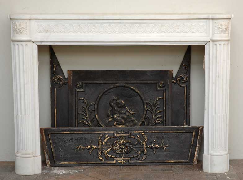 Antique_Louis_XVI_semi_statuary_marble_mantel.jpg
