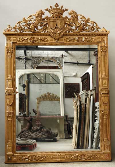 Gilded_antique_trumeau_with_shields_held_by_lions.jpg