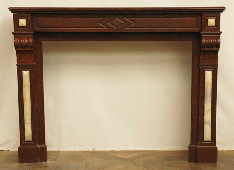 Камин из красного мрамора гриот и вставками из оникса. Камин из красного мрамора гриот и вставками из оникса.-0