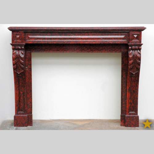 Камин из мрамора красный Гриотт