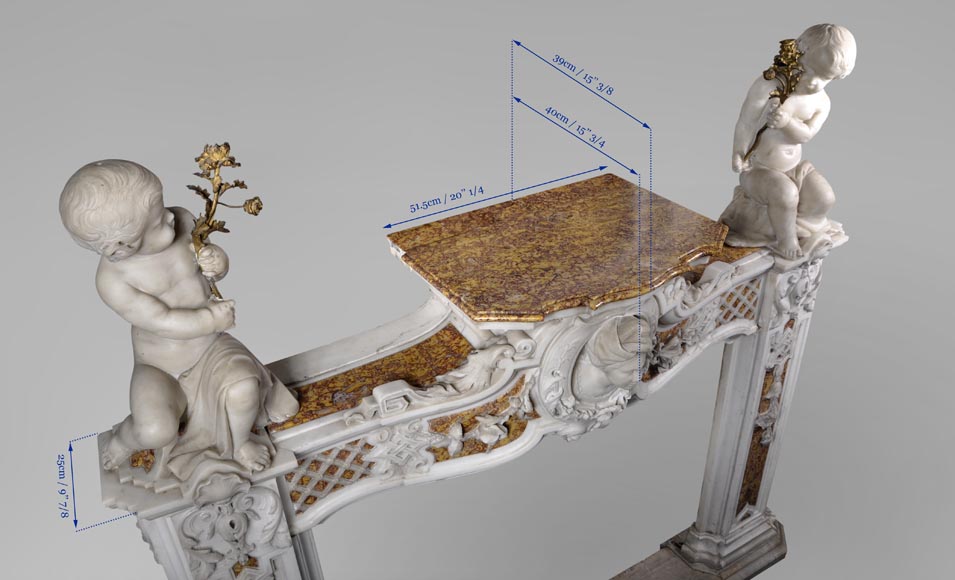 Великолепный старинный камин конца 18 века, изготовленный из скульптурного мрамора и мрамора брокатель, украшенный ангелочком. Великолепный старинный камин конца 18 века, изготовленный из скульптурного мрамора и мрамора брокатель, украшенный ангелочком.-19