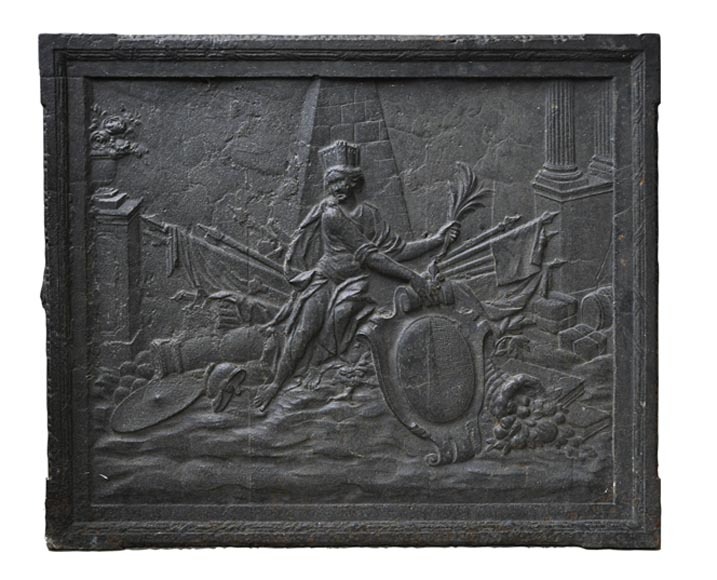 Старинная каминная плита, украшенная гербами города Мец.-0