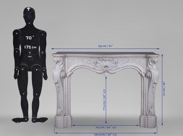 Красивый камин в стиле Людовика XV, украшенный пышными орнаментам, изготовленный из белого каррарского мрамора.-13
